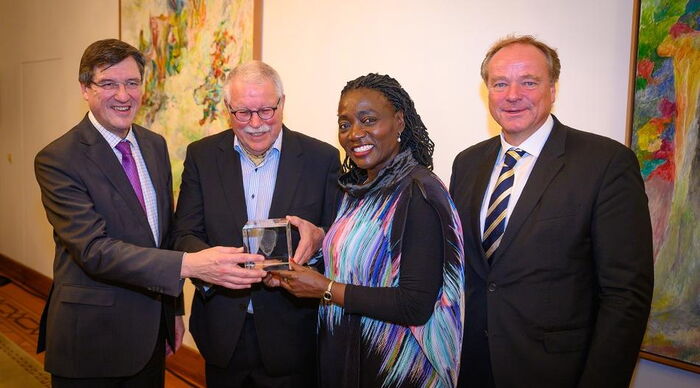 Karl-Heinz Paqué, Manfred Vohrer,  Auma Obama and Dirk Niebel. The four posed for a photo after the award was presented to Auma on Tuesday night, November 19.