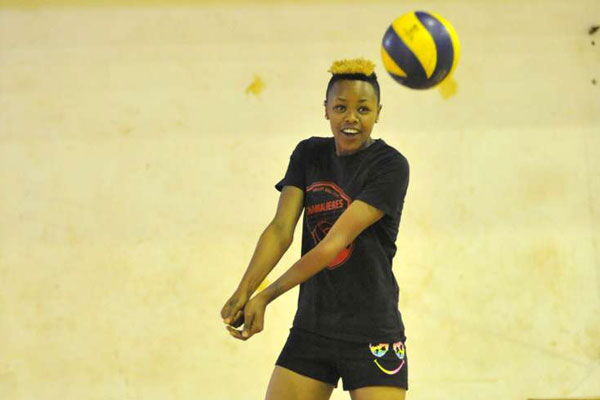 A past photo of Malkia strikers player Jane Wacu in action