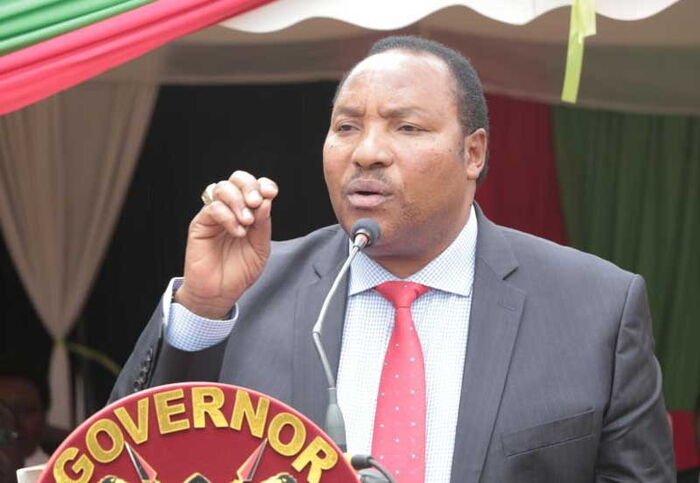 Image result for Images of Waititu and Uhuru at the burial of a Murang'a tycoon Thayu Kamau at Gitui village