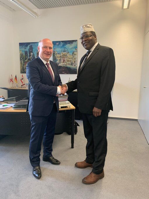 CDU Chairman Kai Wegner shakes hands with self-styled National Resistance Movement (NRM) leader Miguna Miguna in Berlin, Germany on Monday, January 13