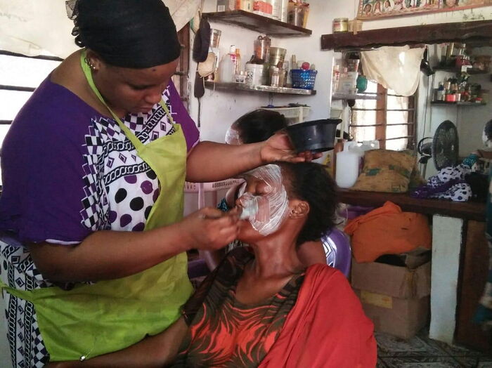 Image result for images of Godhana treating ladies in his county to free makeovers in select salon