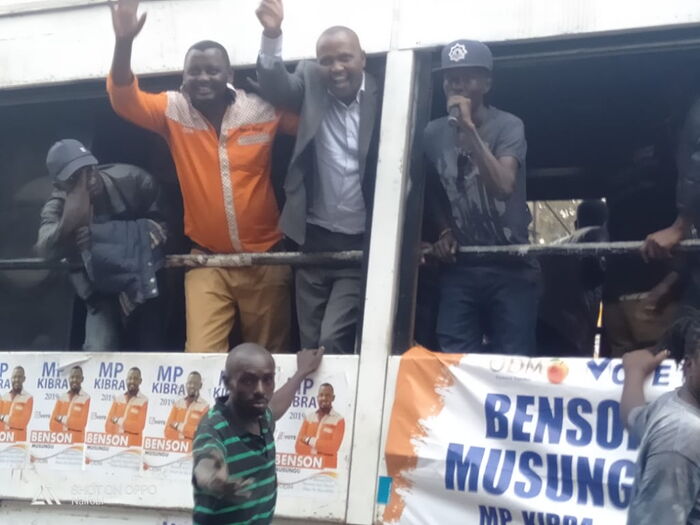 Kuria and Musungu wave at the crowds during the campaigns