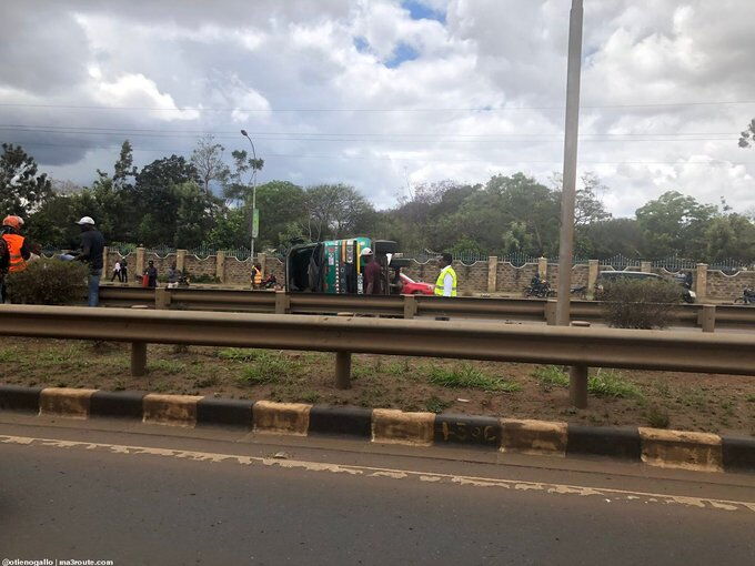 The overturned petrol tanker on Thika road moments before locals began siphoning fuel.