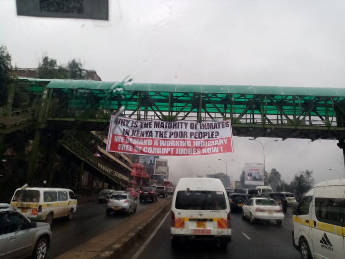 A banner plastered on a footbridge along Thika Super Highway.