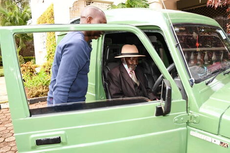 Kapeseret MP Oscar Sudi with Kimisoi Kurgat Arap Ng'isirei during his 100th birthday on July 14, 2020