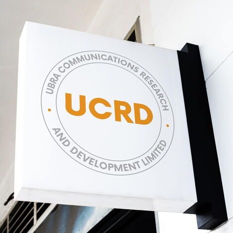 An image of a signpost of the Ubra Communications Research and Development consultancy firm in Nairobi.