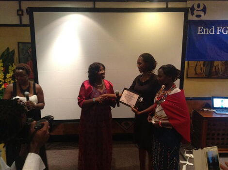 Christine Ghati receiving an award at a past event in Nairobi on September 25, 2015.