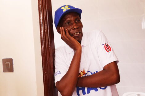 MMU Lecturer Dishon Kiiru in awe after winning a mansion