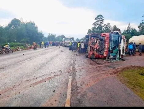 A trailer overturns on a 14-seater matatu along the Webuye-Eldoret highway on July 3, 2022.