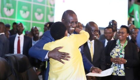 Wiliam Ruto hugging his wife Racheal Ruto while holding the certificate after being declared president-elect in the August 9 general election at Bomas of Kenya on August 15, 2022