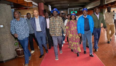 Raila Odinga walking out from KICC flanked by other Azimio One Kenya Coalition leaders after addressing the Media on August 16, 2022