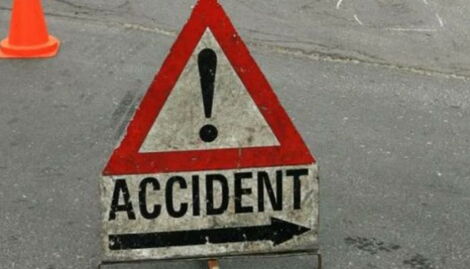 An undated road sign displaying an accident sign