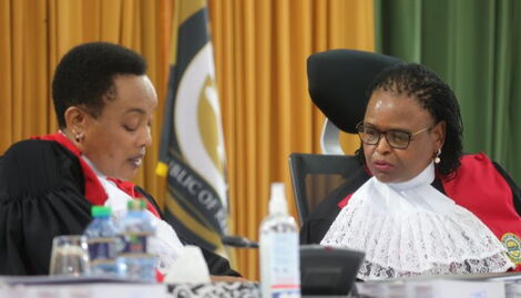 Deputy Chief Justice Philomena Mwilo (left) consulting with Chief Justice Martha Koome (right) in the Supreme court of Kenya on August 31, 2022