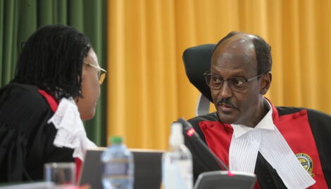 Chief Justice Martha Koome (left) consulting with Hon. Justice Mohammed Ibrahim during petition hearings at the Supreme court on August 31, 2022