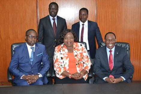 Mama Ida Odinga (centre), KFCB CEO Ezekiel Mutua (right), and other leaders pose for a photo at the EA Spectre on Tuesday, February 18, 2020