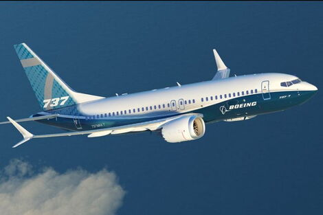 A Boeing 737 plane while flying in the sky
