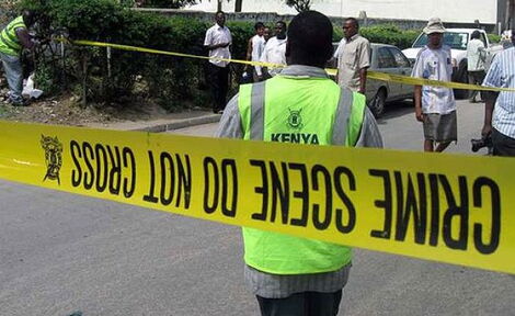 A Kenyan Police Officer at a crime scene