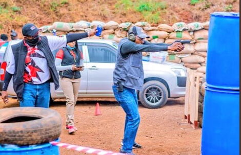 A Kenyan Shooter in Action During the Competition.