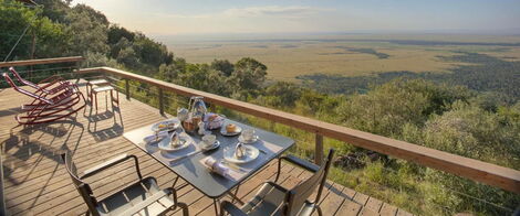 A balcony overlooking the wild inside a tented suite at Angara Mara.