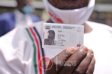 A person holding the new Huduma Namba Card unveiled on Tuesday, October 20, 2020.