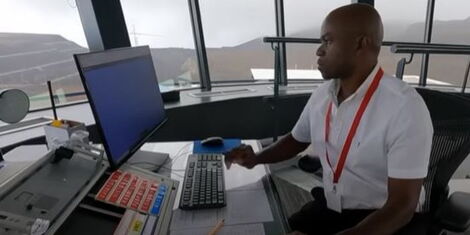 A photo of Bramwell Bushuru at the flight control tower at St Helena Airport on St Helena Island..jpg
