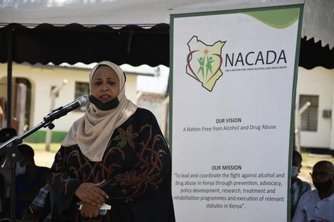 A photo of Amina Abdalla speaking during a function held on October 7