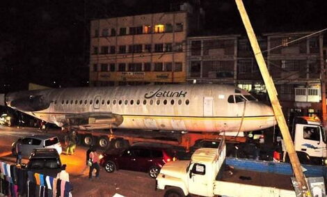 A plane's fuselage causes traffic in Kiambu Town on Sunday, January 30, 2022.