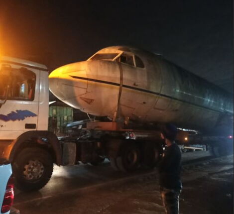 A plane's fuselage causes traffic in Kiambu Town on Sunday, January 30, 2022.