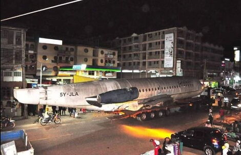 A plane's fuselage causes traffic in Kiambu Town on Sunday, January 30, 2022.