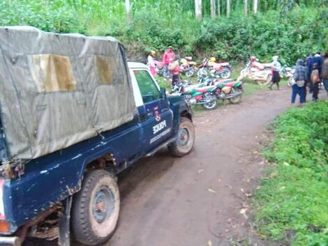 A police car outside a house in Kapcheplim Village, Elgeyo Marakwet County where bodies of a mother and three children were found on Saturda, July 25, 2020.