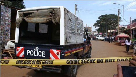 A police vehicle at a scene of a crime