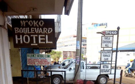 A signpost of Iroko Boulevard Hotel managed by Kennedy Muyundo.