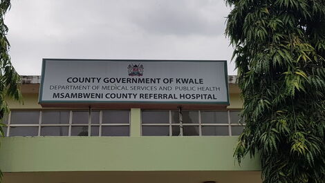 A signpost showing the Msambweni County Referral Hospital