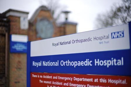 A sign pointing to the Royal National Orthopedic Hospital NHS Trust