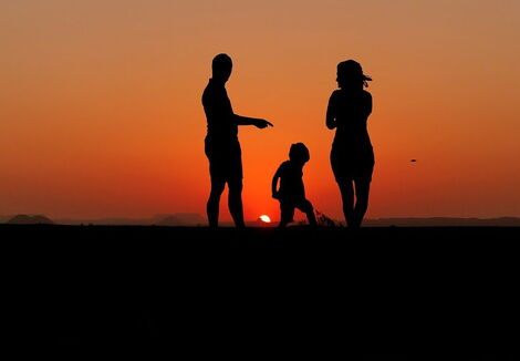 A silhouette of a family.