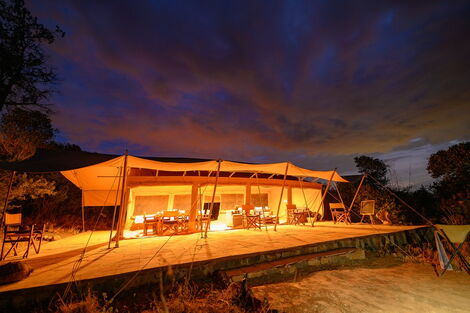 A well-lit tent at the Safari Series Lodge in Kenya