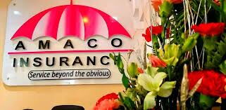AMACO insurance logo on a building