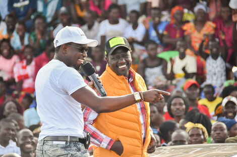 CAS in the Ministry of Foreign Affairs and International Trade Ababu Namwamba together with Deputy President William Ruto during a political rally