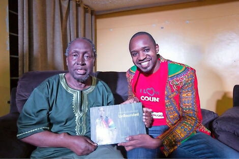 Activist Boniface Mwangi with author Prof Ngugi wa Thiong'o in the United States