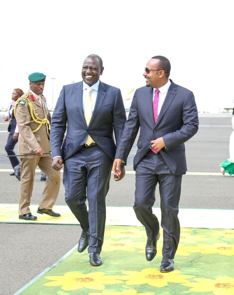 President William Ruto (left) and Ethiopia's Prime Minister Abiy Ahmed at Bole International in Addis Ababa.