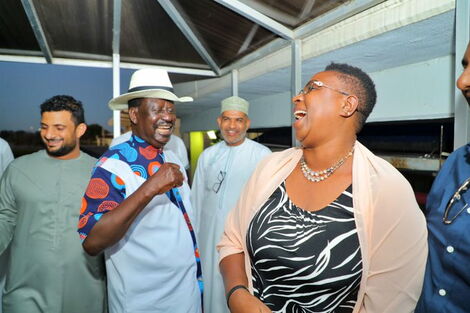Public Service CS Aisha Jumwa shares a light moment with former Prime Minister Raila Odinga in Mombasa in November 2022