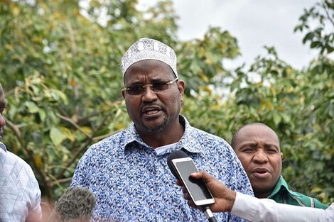 Garsen MP Ali Wario speaking to the press at a past event