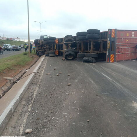 An overturned truck on the Southern Bypass on Monday, May 31