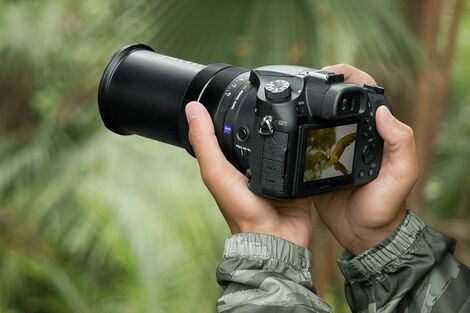 An Undated File Image of A Person Holding A Camera.