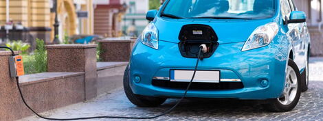 An electric car is charging