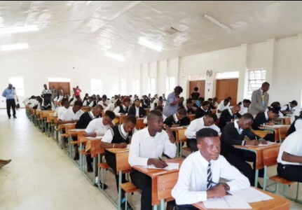 An image of Teachers in a classroom with students in a secondary school