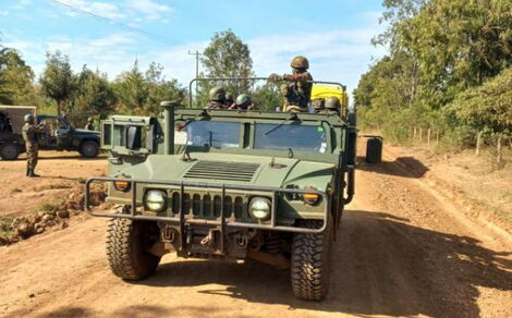 An military vehicle escorts students from Ol Moran Secondary School on Saturday, October 3, 2021.