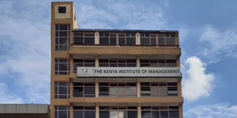 An undated photo of a building displaying the 'Kenya Institute of Management' sign.