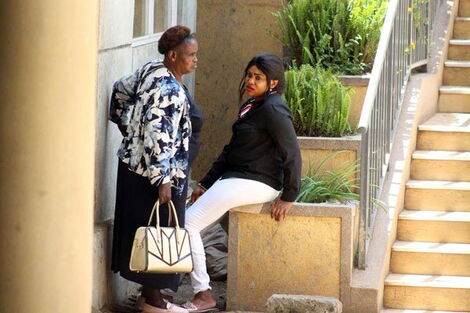 Ann Ngirita (right) and her mother Lucy Ngirita at the Milimani Law Courts on November 13, 2018.
