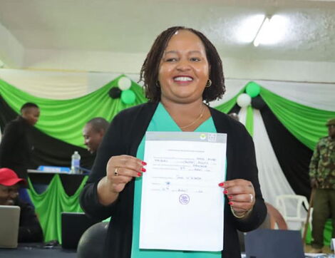 Anne Mumbi Waiguru displays her certificate as the Kirinyaga governor-elect on August 12, 2022.